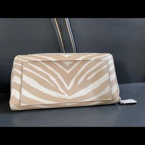 Coach wallet, holds 12 cards, interior zipper pouch, exterior pocket